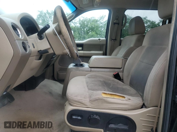 2005 Ford F-150 XLT with VIN 1FTPW145X5KE63882, listed as a Copart auction lot 63299475 with 204,166 mi miles and Salvage title. Bid and sale history available at DreamBid. Image 7.
