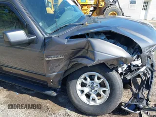 2011 Ford Ranger XLT with VIN 1FTLR4FE7BPA73728, listed as a IAAI auction lot 41827853 with 57,732 mi miles. Bid and sale history available at carsss.com. Image 17.