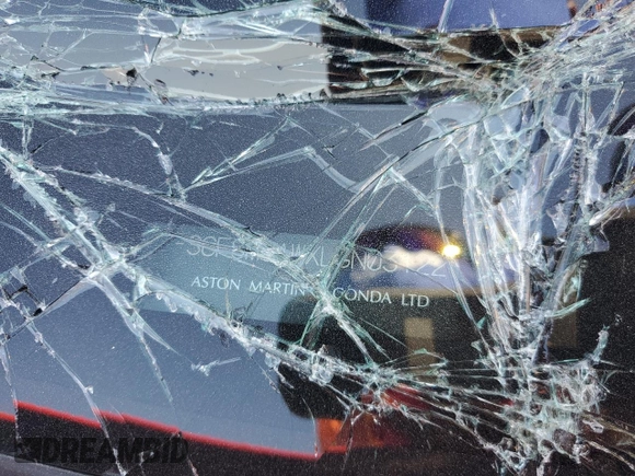 2020 Aston Martin Vantage z VIN SCFSMGAWXLGN03122, wystawiony jako Copart lot #77734374 z przebiegiem Nie podano mil oraz Szkoda całkowita • Salvage title. Historia ofert i sprzedaży dostępna na DreamBid. Obrazek 15.