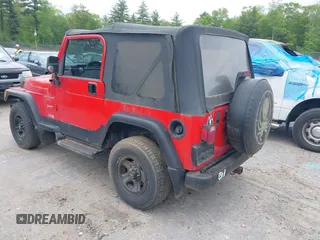 1999 Jeep Wrangler Sport z VIN 1J4FY19S0XP482218, wystawiony jako IAAI lot #42374995 z przebiegiem 149 216 mil mil oraz . Historia ofert i sprzedaży dostępna na DreamBid. Obrazek 3.
