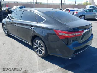 2016 Toyota Avalon Limited with VIN 4T1BK1EB9GU235952, listed as a IAAI auction lot 41042267 with 125,932 mi miles. Bid and sale history available at carsss.com. Image 3.