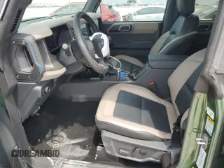 2024 Ford Bronco Wildtrak z VIN 1FMEE2BPXRLB03494, wystawiony jako Copart lot #53852225 z przebiegiem 5 166 mil mil oraz Szkoda całkowita • Salvage title. Historia ofert i sprzedaży dostępna na DreamBid. Obrazek 7.