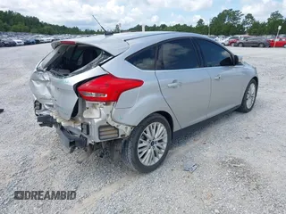 2018 Ford Focus Titanium with VIN 1FADP3N29JL232336, listed as a IAAI auction lot 42485243 with 82,113 mi miles and . Bid and sale history available at DreamBid. Image 4.