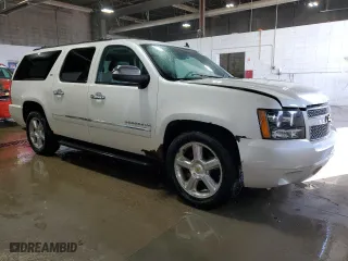 2012 Chevrolet Suburban LTZ with VIN 1GNSKKE74CR325522, listed as a Copart auction lot 52215745 with 214,973 mi miles and Clean Title. Bid and sale history available at carsss.com. Image 4.