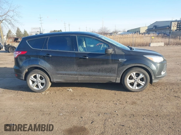 2015 Ford Escape SE with VIN 1FMCU0G79FUA40322, listed as a IAAI auction lot 41791960 with 124,543 mi miles. Bid and sale history available at carsss.com. Image 13.