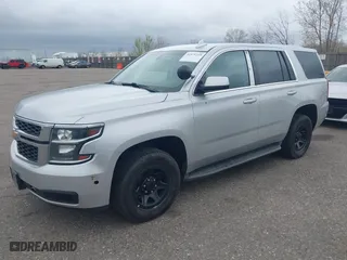 2015 Chevrolet Tahoe Commercial with VIN 1GNSK2ECXFR681555, listed as a IAAI auction lot 41975359 with 126,785 mi miles. Bid and sale history available at carsss.com. Image 17.