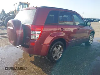 2007 Suzuki Grand Vitara Luxury z VIN JS3TE947474200491, wystawiony jako IAAI lot #42462678 z przebiegiem 230 007 mil mil oraz . Historia ofert i sprzedaży dostępna na DreamBid. Obrazek 4.