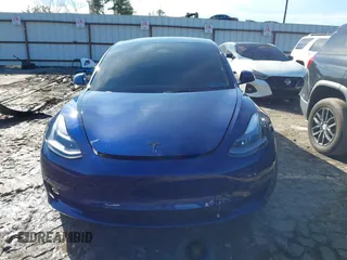 2023 Tesla Model 3 Long Range with VIN 5YJ3E1EB0PF688172, listed as a IAAI auction lot 41411580 with 21,125 mi miles and . Bid and sale history available at DreamBid. Image 12.