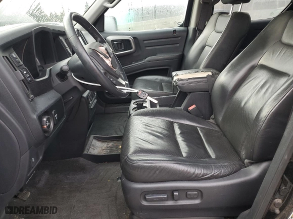 2014 Honda Ridgeline SE with VIN 5FPYK1F68EB012928, listed as a Copart auction lot 48702365 with 124,359 mi miles and Salvage Title. Bid and sale history available at carsss.com. Image 7.