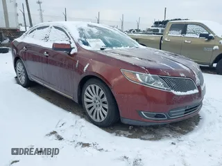 2015 Lincoln MKS with VIN 1LNHL9DK6FG602925, listed as a IAAI auction lot 41313316 with 130,689 mi miles. Bid and sale history available at carsss.com. Image 1.