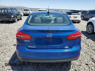2018 Ford Focus SE z VIN 1FADP3FE1JL246725, wystawiony jako Copart lot #57913225 z przebiegiem 52 247 mil mil oraz Czysty tytuł • Clean title. Historia ofert i sprzedaży dostępna na DreamBid. Obrazek 6.