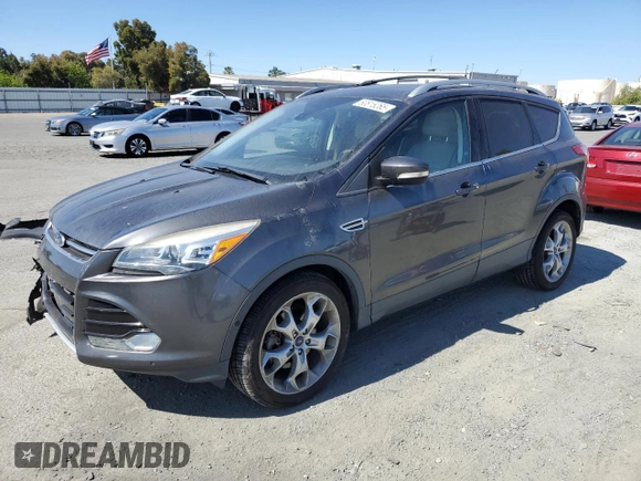 2015 Ford Escape Titanium with VIN 1FMCU9J99FUC13108, listed as a Copart auction lot 60815265 with 70,938 mi miles and Salvage title. Bid and sale history available at DreamBid. Image 1.