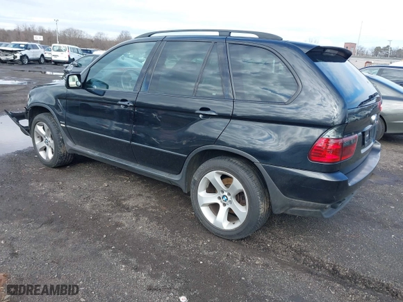 2006 BMW X5 4.4i with VIN 5UXFB53506LV22836, listed as a IAAI auction lot 41727708 with 186,084 mi miles. Bid and sale history available at carsss.com. Image 3.