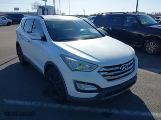 2013 Hyundai Santa Fe 2.0T Sport with VIN 5XYZUDLA9DG116837, listed as a IAAI auction lot 41789420 with 137,708 mi miles. Bid and sale history available at carsss.com. Image 1.