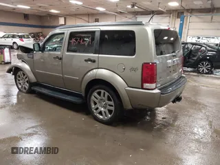 2007 Dodge Nitro SLT z VIN 1D8GU58K57W673543, wystawiony jako IAAI lot #41574634 z przebiegiem 64 286 mil mil oraz . Historia ofert i sprzedaży dostępna na DreamBid. Obrazek 3.