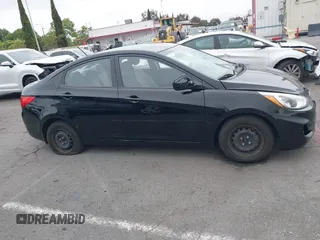 2015 Hyundai Accent GLS z VIN KMHCT4AE8FU827019, wystawiony jako IAAI lot #42179517 z przebiegiem 52 039 mil mil oraz . Historia ofert i sprzedaży dostępna na DreamBid. Obrazek 13.