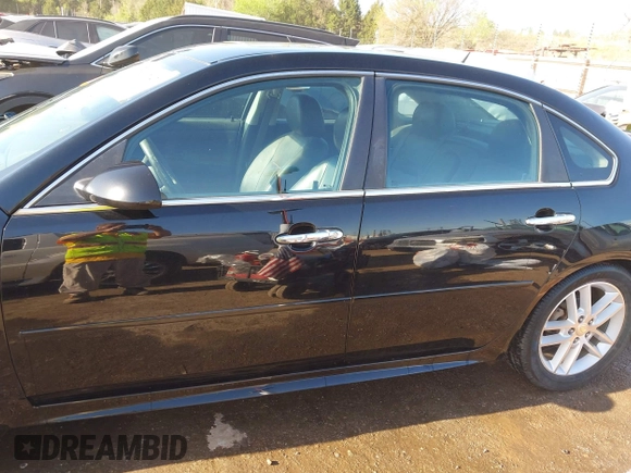 2012 Chevrolet Impala LTZ with VIN 2G1WC5E39C1280827, listed as a IAAI auction lot 41979470 with 153,669 mi miles and . Bid and sale history available at DreamBid. Image 14.