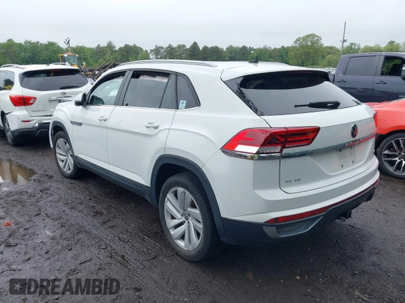 2021 Volkswagen Atlas SE z VIN 1V2KE2CAXMC202664, wystawiony jako IAAI lot #42292276 z przebiegiem 57 760 mil mil oraz . Historia ofert i sprzedaży dostępna na DreamBid. Obrazek 3.