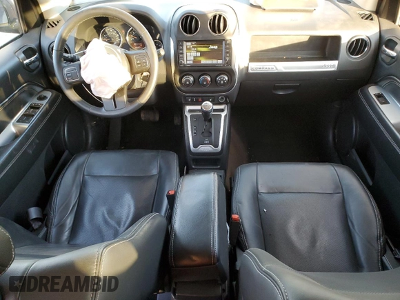 2014 Jeep Compass High Altitude with VIN 1C4NJCEAXED680799, listed as a Copart auction lot 89081285 with 63,447 mi miles and Salvage Title. Bid and sale history available at carsss.com. Image 8.