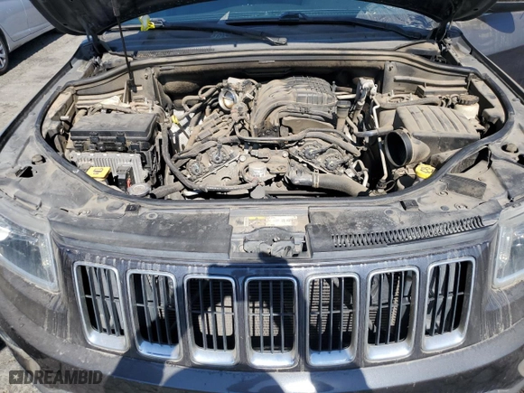 2014 Jeep Grand Cherokee Laredo with VIN 1C4RJEAG7EC212915, listed as a Copart auction lot 70144534 with 169,851 mi miles and Clean Title. Bid and sale history available at carsss.com. Image 12.