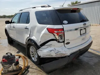 2014 Ford Explorer XLT with VIN 1FM5K7D95EGA21454, listed as a Copart auction lot 72159824 with 128,765 mi miles and Salvage Title. Bid and sale history available at carsss.com. Image 2.