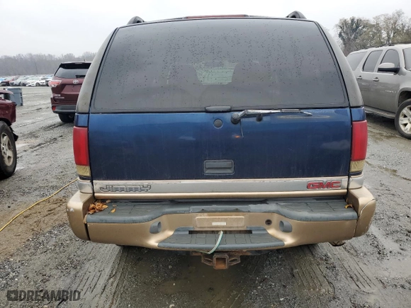 1999 GMC Jimmy SLE with VIN 1GKDT13W8X2545509, listed as a Copart auction lot 81608944 with 130,881 mi miles and Salvage Title. Bid and sale history available at carsss.com. Image 6.