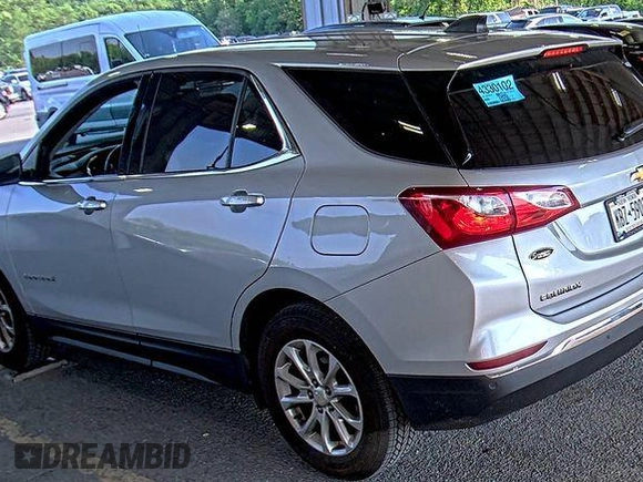 2020 Chevrolet Equinox LT z VIN 2GNAXJEV5L6230548, wystawiony jako IAAI lot #42573168 z przebiegiem 95 519 mil mil oraz . Historia ofert i sprzedaży dostępna na DreamBid. Obrazek 6.