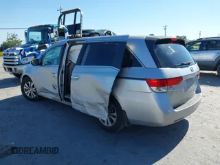2014 Honda Odyssey EX-L with VIN 5FNRL5H63EB041106, listed as a IAAI auction lot 42294113 with 122,610 mi miles and . Bid and sale history available at DreamBid. Image 3.