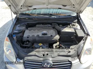 2007 Hyundai Accent GL z VIN KMHCN45C77U073194, wystawiony jako Copart lot #42955445 z przebiegiem 248 364 mil mil oraz Nie do naprawy • Non repairable. Historia ofert i sprzedaży dostępna na DreamBid. Obrazek 12.