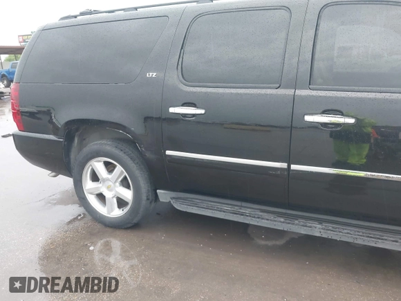 2011 Chevrolet Suburban LTZ with VIN 1GNSKKE32BR100379, listed as a IAAI auction lot 42115686 with 174,830 mi miles and . Bid and sale history available at DreamBid. Image 6.