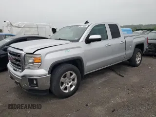 2015 GMC Sierra 1500 SLT with VIN 1GTR1VECXFZ165482, listed as a Copart auction lot 53111034 with 136,644 mi miles and Salvage title. Bid and sale history available at DreamBid. Image 1.