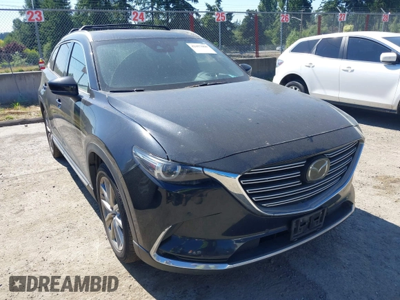2018 Mazda CX-9 Grand Touring z VIN JM3TCBDY2J0237050, wystawiony jako IAAI lot #42457060 z przebiegiem 130 625 mil mil oraz . Historia ofert i sprzedaży dostępna na DreamBid. Obrazek 6.