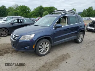 2011 Volkswagen Tiguan SEL z VIN WVGBV7AX2BW534482, wystawiony jako Copart lot #61097265 z przebiegiem 186 282 mil mil oraz Czysty tytuł • Clean title. Historia ofert i sprzedaży dostępna na DreamBid. Obrazek 1.