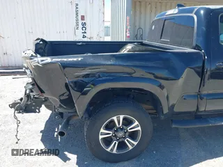 2018 Toyota Tacoma SR5 with VIN 3TMBZ5DN1JM014540, listed as a IAAI auction lot 42505324 with 112,990 mi miles and . Bid and sale history available at DreamBid. Image 6.