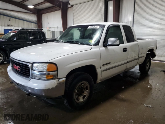 1999 GMC Sierra 1500 with VIN 1GTFC29U2XZ518488, listed as a Copart auction lot 74092634 with 447,082 mi miles and Salvage Title. Bid and sale history available at DreamBid. Image 1.