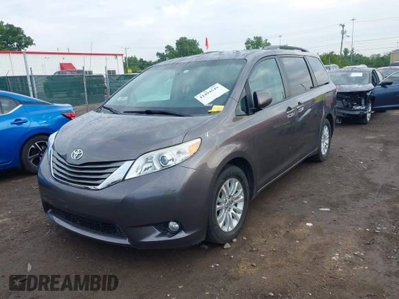 2014 Toyota Sienna XLE with VIN 5TDYK3DC0ES496716, listed as a IAAI auction lot 42494549 with 158,645 mi miles and . Bid and sale history available at DreamBid. Image 12.