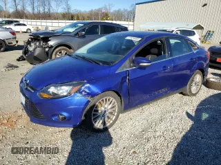 2014 Ford Focus Titanium with VIN 1FADP3J27EL410059, listed as a Copart auction lot 41634085 with 156,053 mi miles and Salvage Title. Bid and sale history available at carsss.com. Image 1.