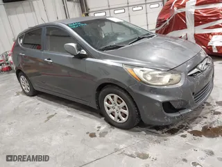 2013 Hyundai Accent GL with VIN KMHCT5AEXDU100208, listed as a IAAI auction lot 41517792 with 164,510 mi miles. Bid and sale history available at carsss.com. Image 1.