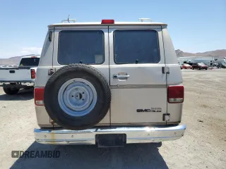 1994 GMC Vandura z VIN 1GDEG25K4RF512695, wystawiony jako Copart lot #63562414 z przebiegiem 171 855 mil mil oraz Szkody całkowita. Historia ofert i sprzedaży dostępna na DreamBid. Obrazek 6.