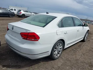 2012 Volkswagen Passat SEL with VIN 1VWCP7A30CC090499, listed as a IAAI auction lot 42037393 with 174,582 mi miles. Bid and sale history available at carsss.com. Image 4.