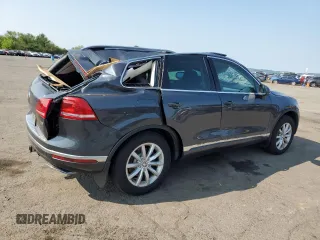 2015 Volkswagen Touareg Lux с VIN WVGEP9BP6FD003059, выставлен на аукционе Copart как лот 59670505 с пробегом 162 945 миль миль и Списание • Salvage title. История ставок и продаж доступна на DreamBid. Изображение 3.