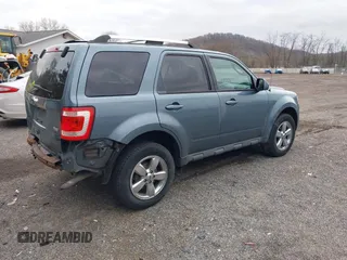 2012 Ford Escape Limited with VIN 1FMCU9EG9CKA05004, listed as a IAAI auction lot 41931038 with 126,086 mi miles. Bid and sale history available at carsss.com. Image 4.