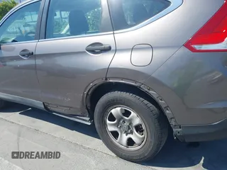 2013 Honda CR-V LX with VIN 3CZRM3H34DG705066, listed as a IAAI auction lot 42661478 with 318,027 mi miles and . Bid and sale history available at DreamBid. Image 6.
