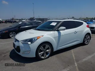 2013 Hyundai Veloster w/Black Int with VIN KMHTC6AD8DU174885, listed as a IAAI auction lot 42408175 with 132,366 mi miles and . Bid and sale history available at DreamBid. Image 2.