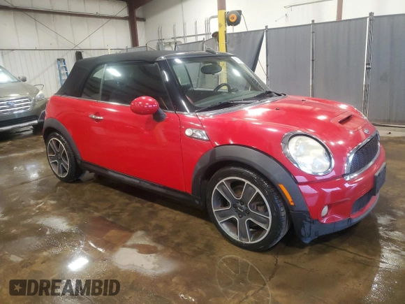 2010 MINI Convertible S with VIN WMWMS3C50ATY51636, listed as a Copart auction lot 66097715 with 103,525 mi miles and Salvage title. Bid and sale history available at DreamBid. Image 4.