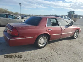 2000 Mercury Grand Marquis LS z VIN 2MEFM75W9YX641907, wystawiony jako Copart lot #50722975 z przebiegiem 152 108 mil mil oraz Szkody całkowita. Historia ofert i sprzedaży dostępna na DreamBid. Obrazek 3.