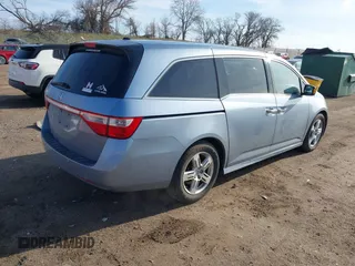 2011 Honda Odyssey Touring with VIN 5FNRL5H9XBB085626, listed as a IAAI auction lot 41890577 with 178,317 mi miles and . Bid and sale history available at DreamBid. Image 4.