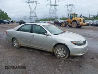 2004 Toyota Camry LE z VIN 4T1BE32K24U939042, wystawiony jako IAAI lot #42324099 z przebiegiem 151 784 mil mil oraz . Historia ofert i sprzedaży dostępna na DreamBid. Obrazek 12.
