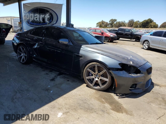 2014 BMW M6 z VIN WBSLX9C52ED160538, wystawiony jako Copart lot #64329095 z przebiegiem Nie podano mil oraz Szkoda całkowita • Salvage title. Historia ofert i sprzedaży dostępna na DreamBid. Obrazek 4.