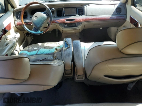 2000 Mercury Grand Marquis LS z VIN 2MEFM75W7YX694301, wystawiony jako Copart lot #57225295 z przebiegiem 141 420 mil mil oraz Szkoda całkowita • Salvage title. Historia ofert i sprzedaży dostępna na DreamBid. Obrazek 8.